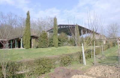 Finca en venta Arezzo, Toscana, RIF2262-lang7#RIF 2262 Teilansicht Stallungen und Dressurplatz